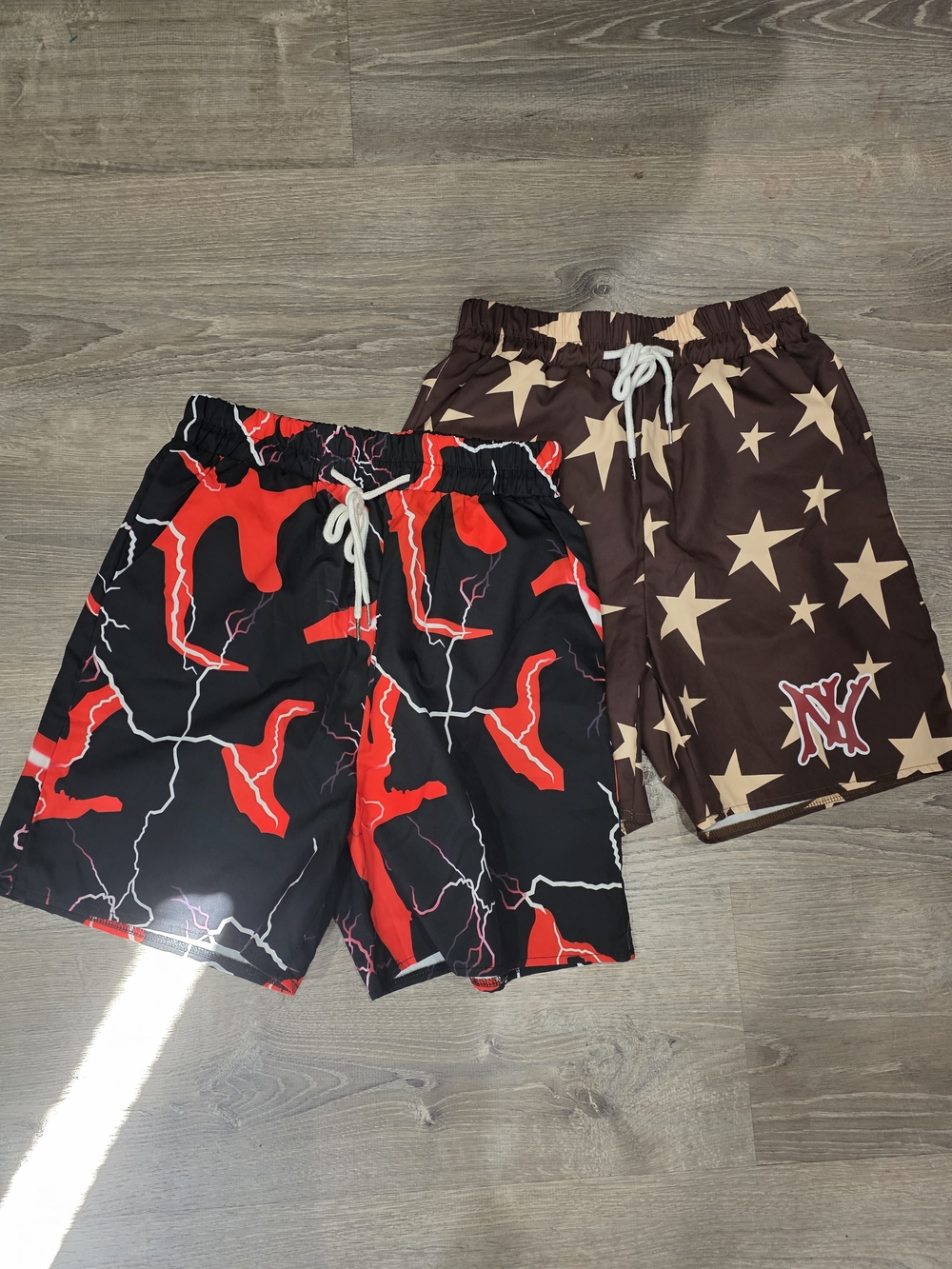 ROMWE Black Swim Shorts with Red Lightning Print